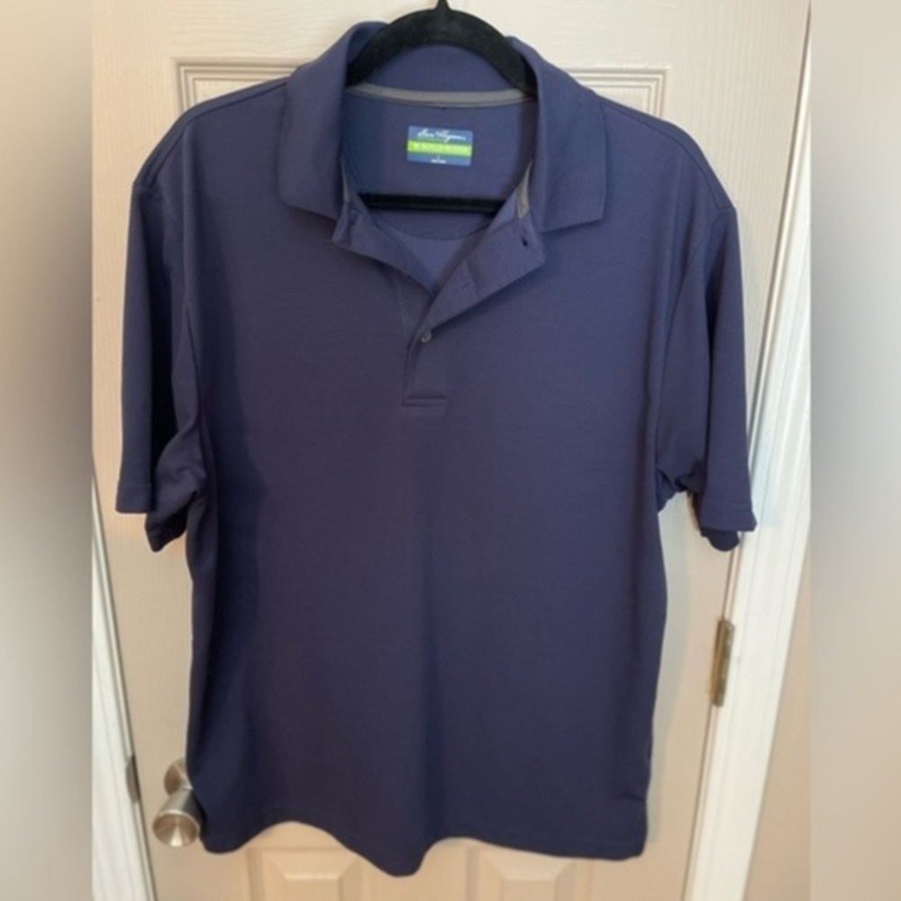 Ben Hogan Performance navy blue 30% recycled polyester short sleeve golf polo. L
